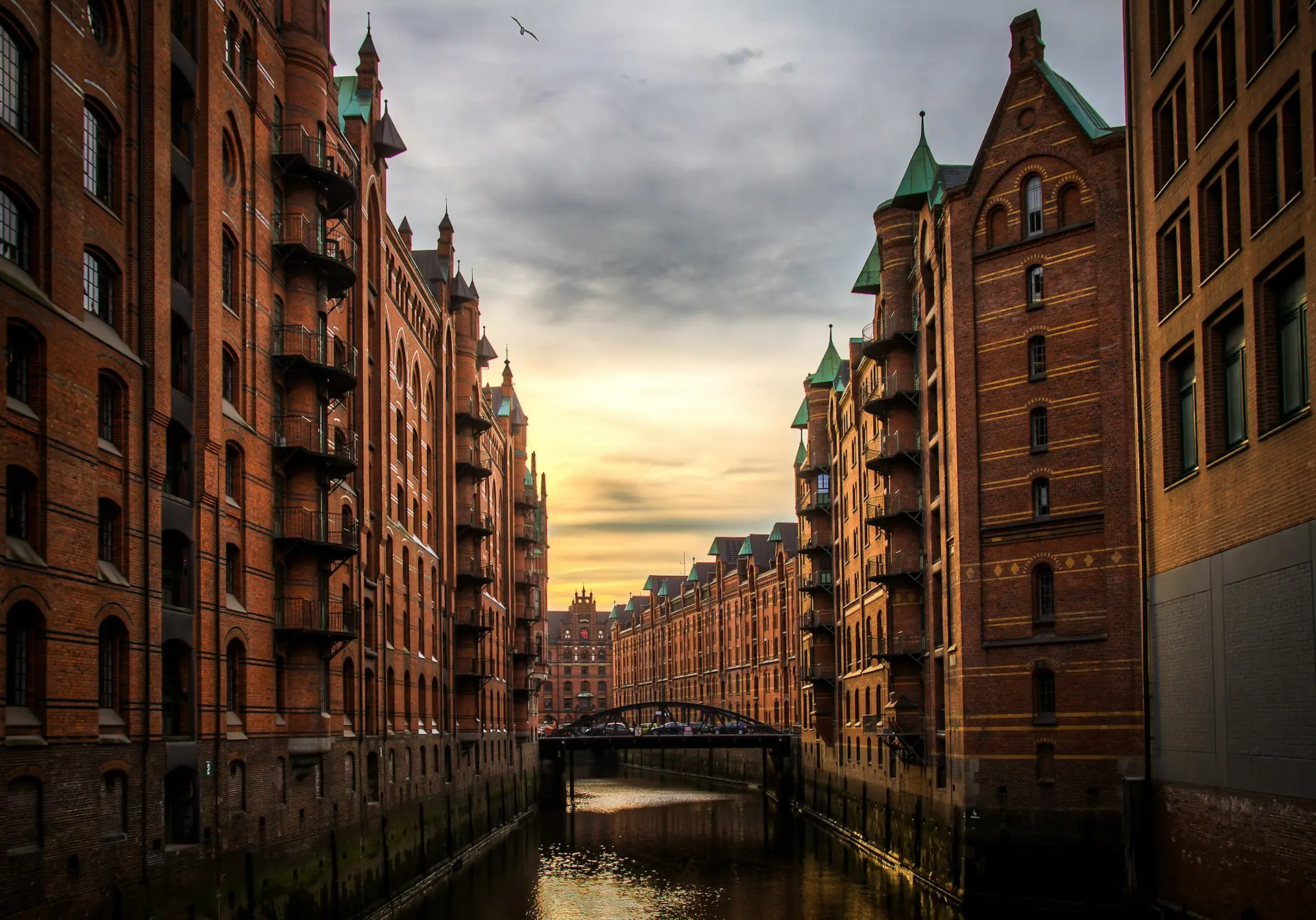 river between brown concrete buildings